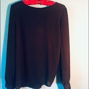 Sheer black top with back exposed